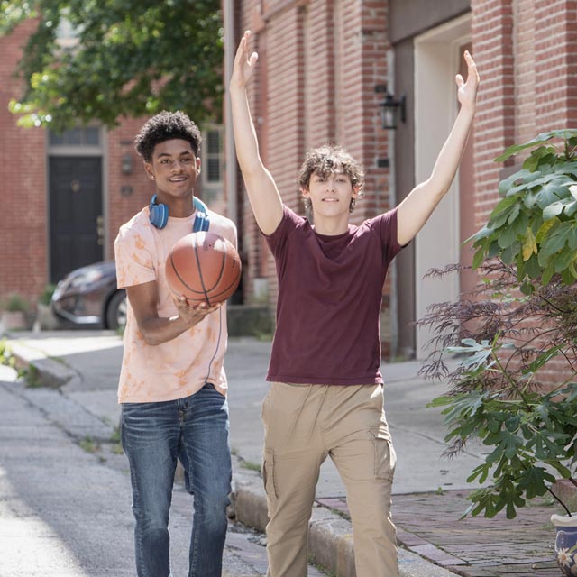 Common Questions-2 boys play basketball