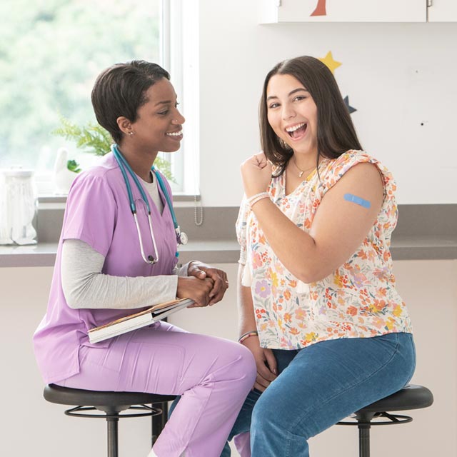 Common Questions-adolescent girl with doctor